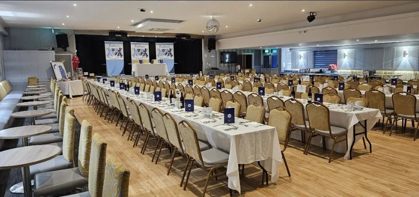 Spacious function room at Poplar Social Club set up for an event