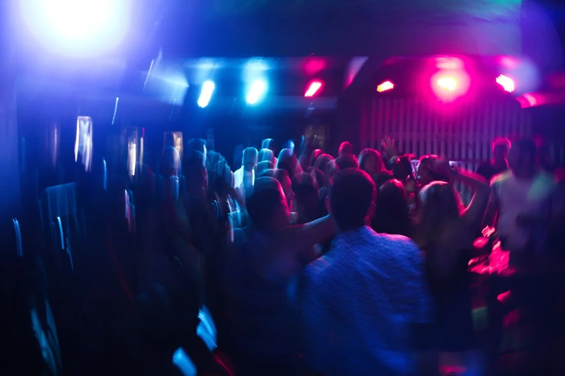 Live band playing as guests dance at Poplar Social Club