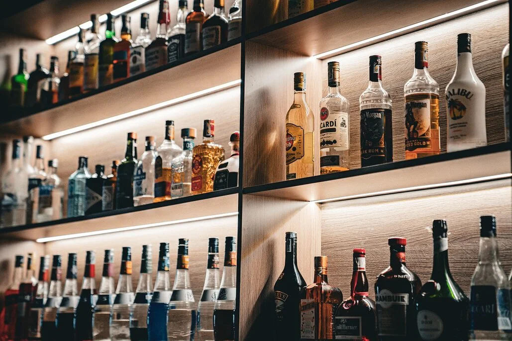 Guests ordering drinks at the club bar during a wedding reception